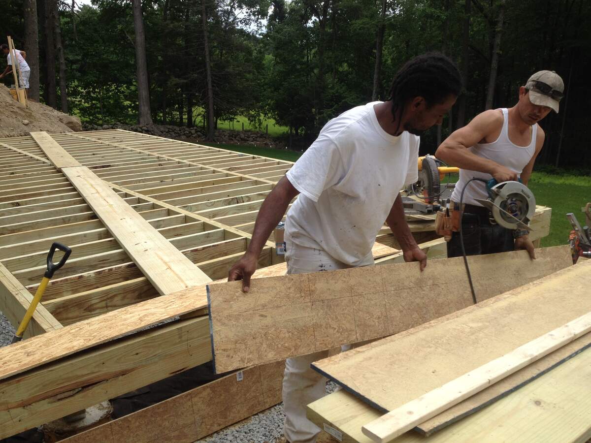 Crew framing Harvard deck