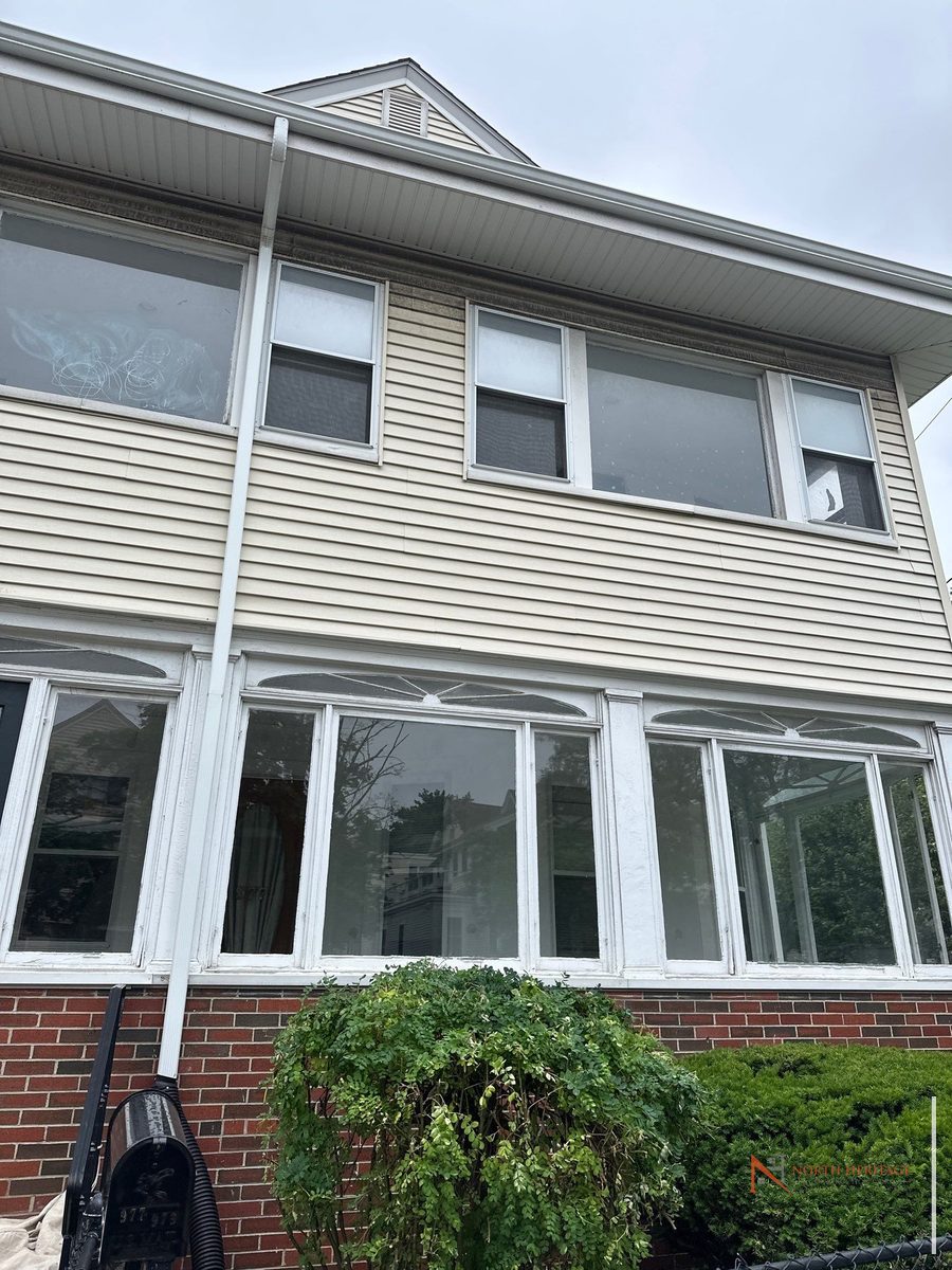 Somerville MA home before addition - aging enclosed porch exterior