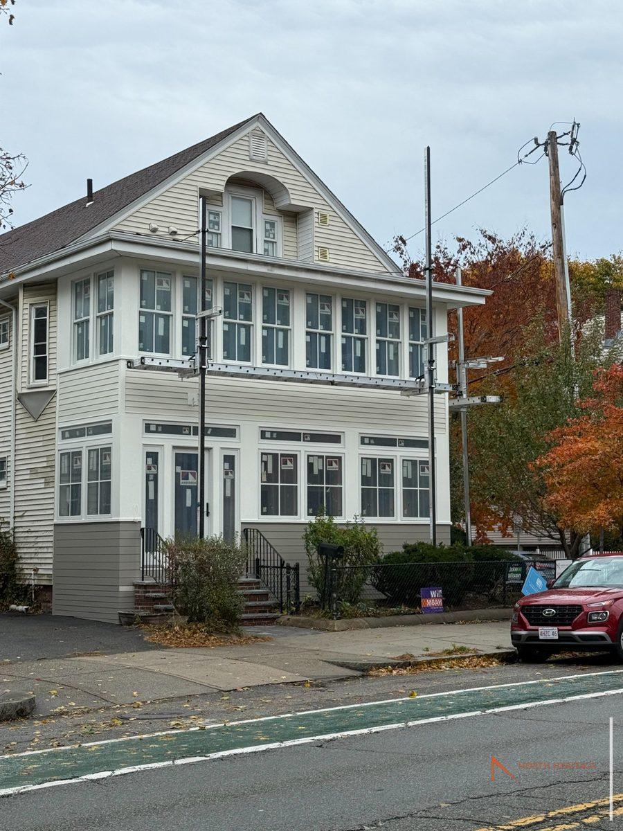 Front view of completed Somerville home addition with Andersen windows