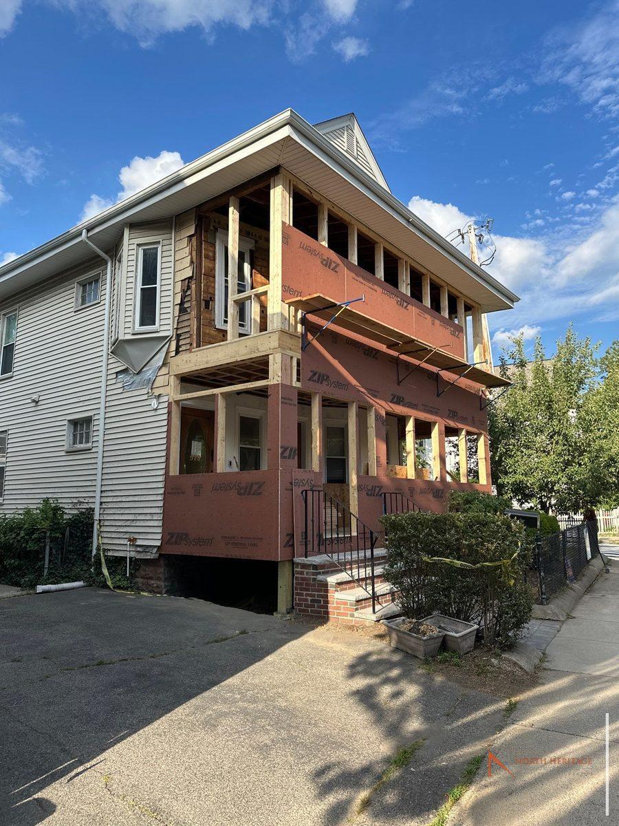 Two-story wall framing with ZIP sheathing on Somerville addition